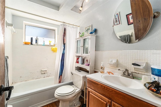 full bathroom featuring vanity, toilet, and shower / bath combo