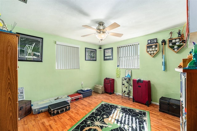 interior space featuring ceiling fan and light hardwood / wood-style floors