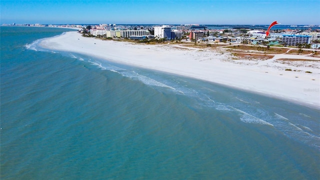 bird's eye view featuring a beach view and a water view