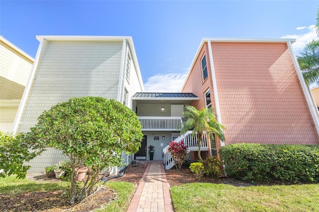 exterior space featuring a balcony