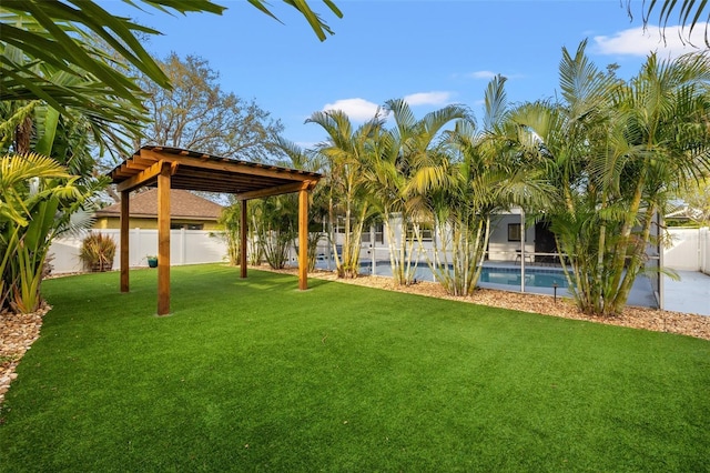 view of yard featuring fence and a fenced in pool