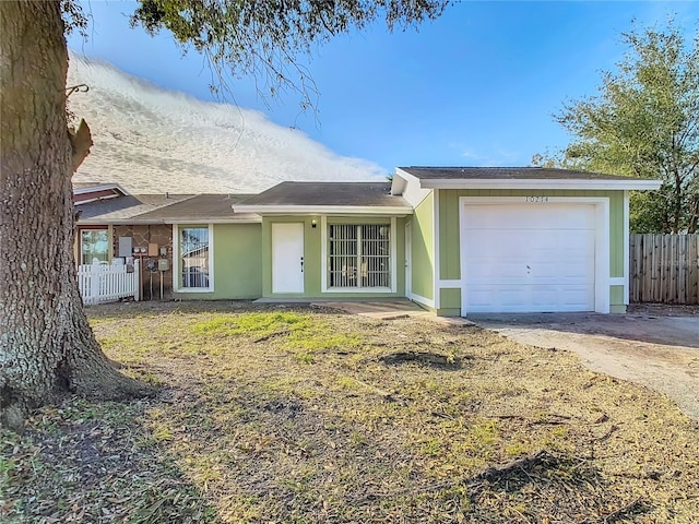 single story home with a garage