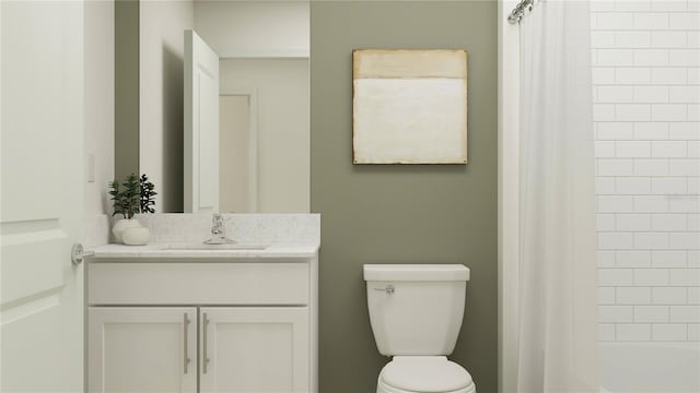 full bathroom with shower / tub combo, vanity, and toilet