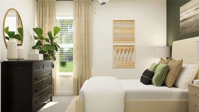 carpeted bedroom featuring multiple windows