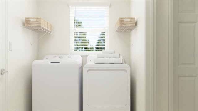 laundry room featuring washer and clothes dryer