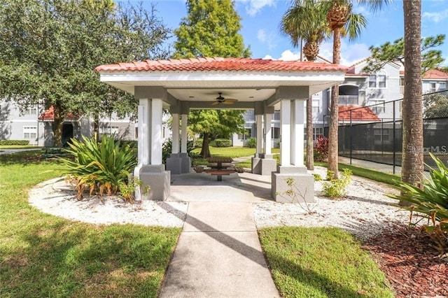 view of home's community with a gazebo and a yard