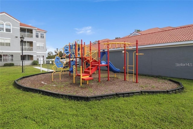 view of play area with a yard