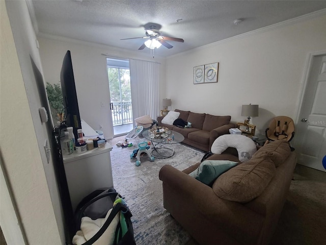 living room featuring crown molding, ceiling fan, and a textured ceiling