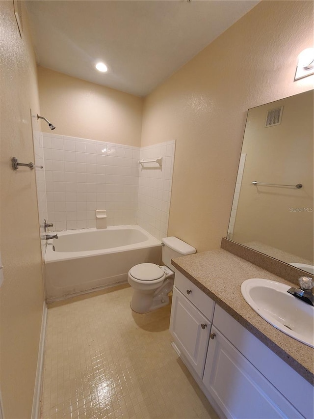 full bathroom with vanity, toilet, and shower / bath combination