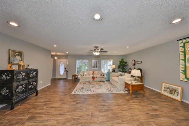 living room with a textured ceiling