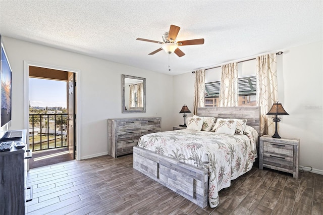 bedroom featuring ceiling fan, dark hardwood / wood-style floors, access to exterior, and a textured ceiling