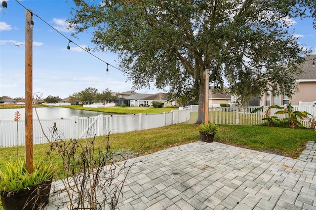 view of patio / terrace with a water view