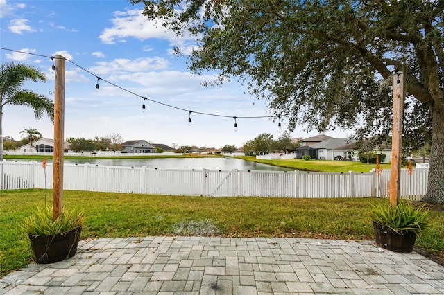 view of patio / terrace with a water view