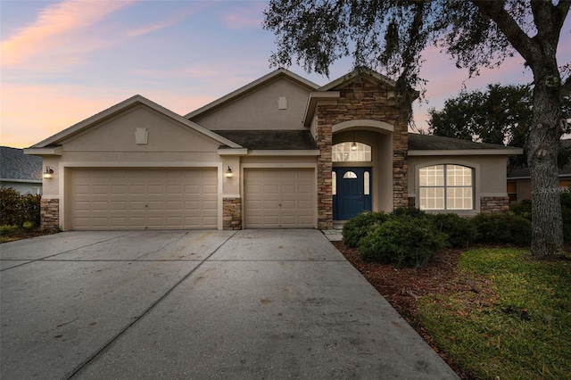 view of front of home with a garage