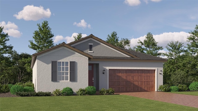 view of front of home featuring a garage and a front yard