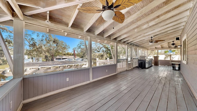 wooden deck with ceiling fan