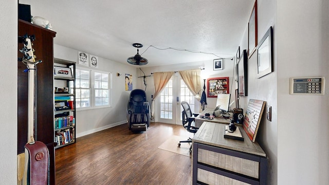 office area featuring dark hardwood / wood-style floors and a textured ceiling