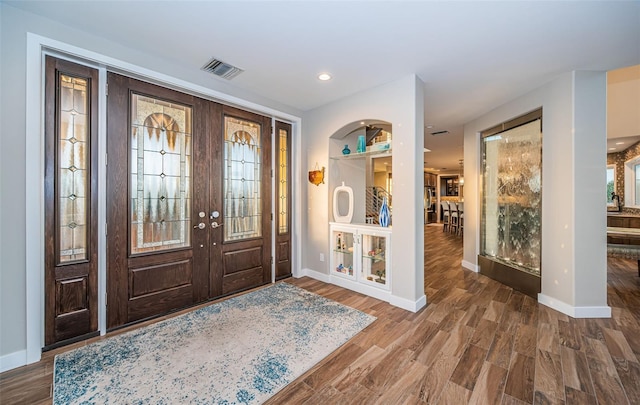 foyer featuring hardwood / wood-style floors