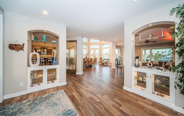 entryway with wood-type flooring