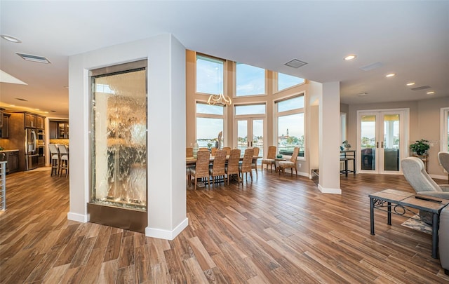 interior space featuring hardwood / wood-style floors and french doors