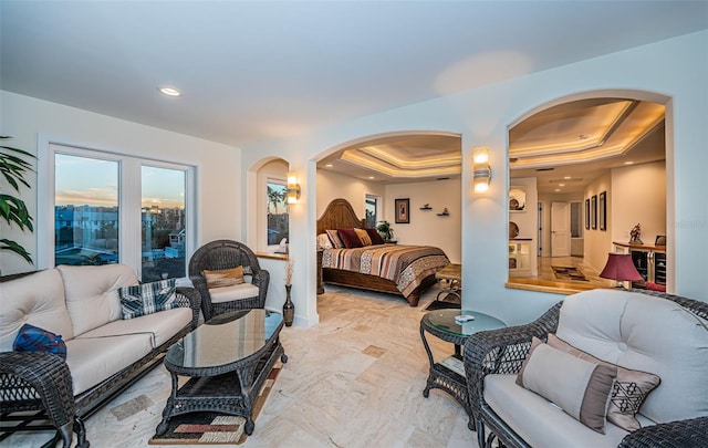 bedroom featuring a raised ceiling