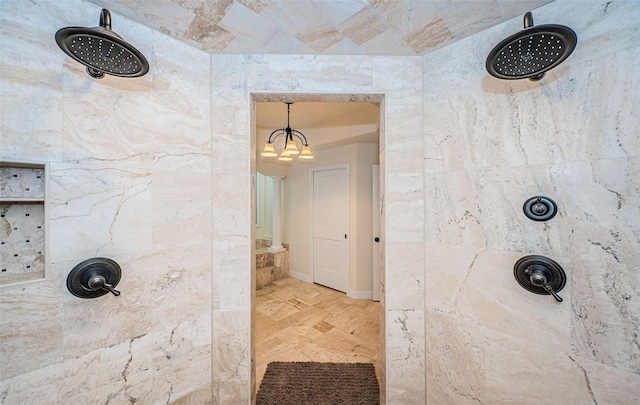 bathroom featuring a tile shower