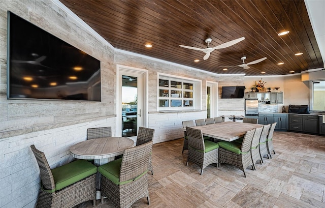 dining room featuring crown molding, wooden ceiling, and ceiling fan