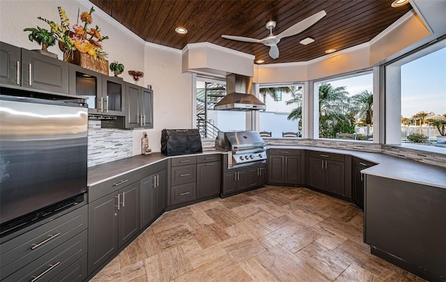 kitchen with crown molding, wood ceiling, ceiling fan, island exhaust hood, and decorative backsplash