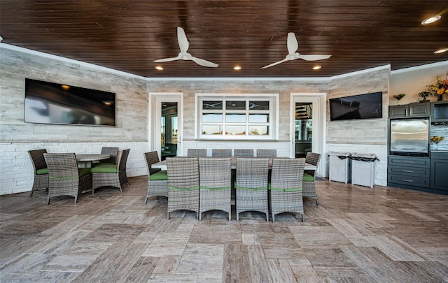 view of patio / terrace featuring ceiling fan