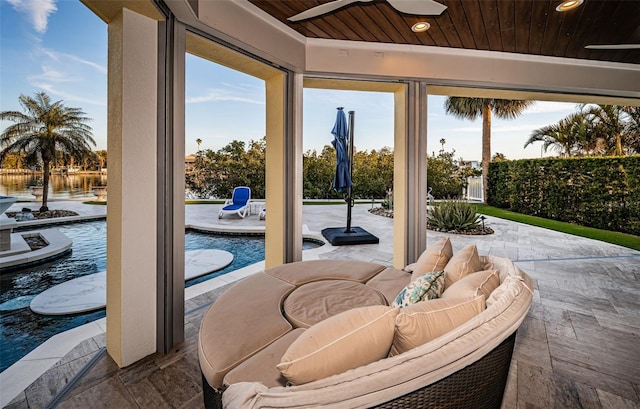 view of patio / terrace featuring ceiling fan