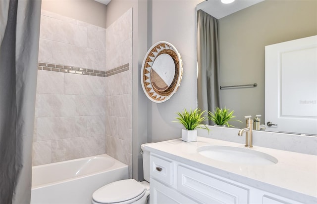 full bathroom featuring vanity, toilet, and shower / tub combo