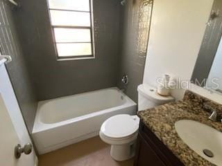 full bathroom with vanity, washtub / shower combination, and toilet