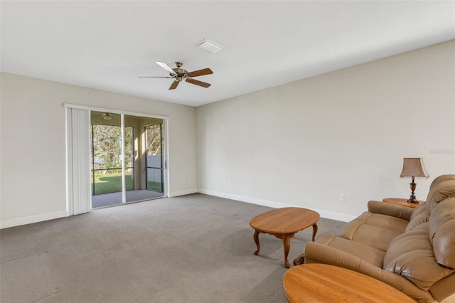 living room with a ceiling fan, carpet, visible vents, and baseboards