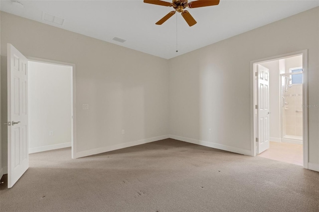 empty room featuring carpet, ceiling fan, and baseboards