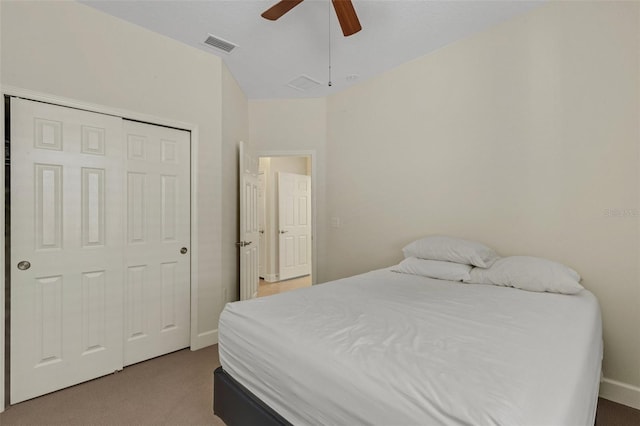 carpeted bedroom featuring a closet, visible vents, ceiling fan, and baseboards