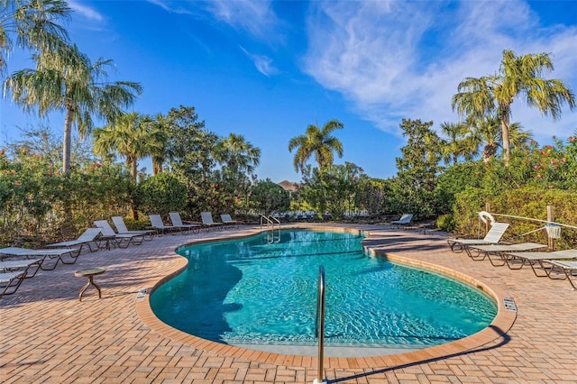 pool with a patio