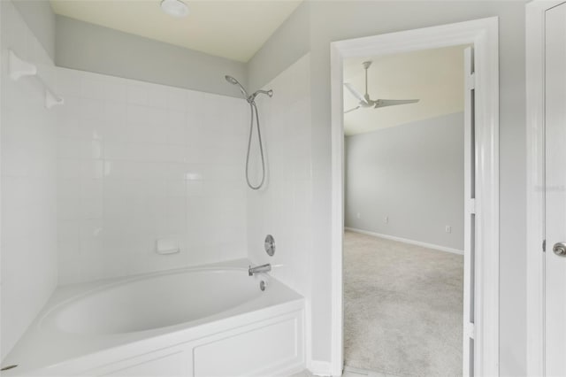 bathroom featuring shower / tub combination and ceiling fan