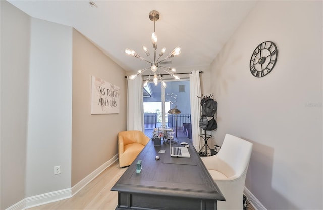 office area with light hardwood / wood-style floors