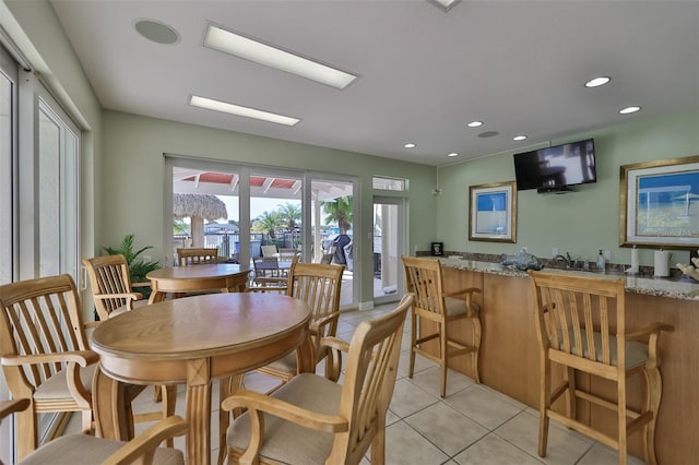 tiled dining area with bar