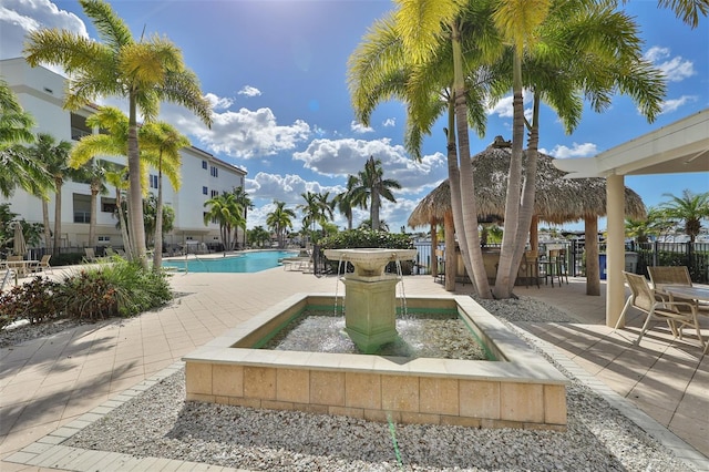 view of pool featuring a gazebo and a patio