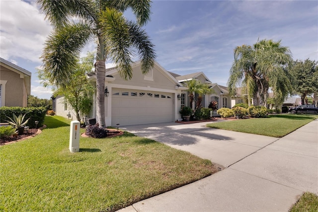 view of front facade with a garage and a front yard