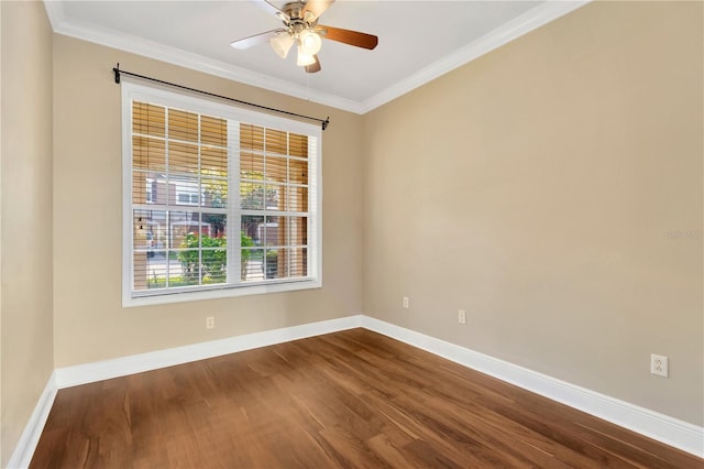 spare room with hardwood / wood-style flooring, ceiling fan, and ornamental molding