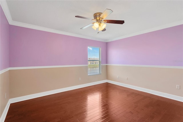 empty room with hardwood / wood-style flooring, ceiling fan, and ornamental molding