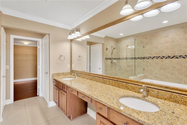 bathroom with ornamental molding, an enclosed shower, tile patterned floors, and vanity