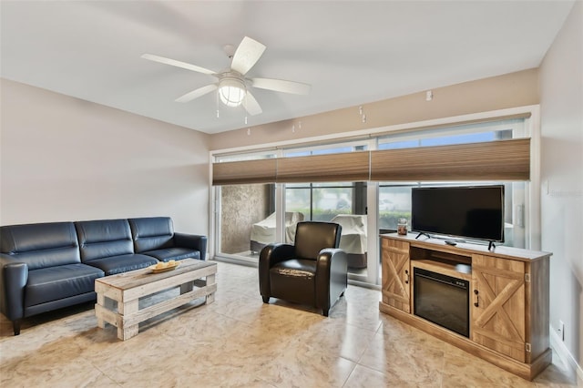 living room with ceiling fan