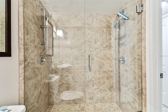 bathroom featuring an enclosed shower