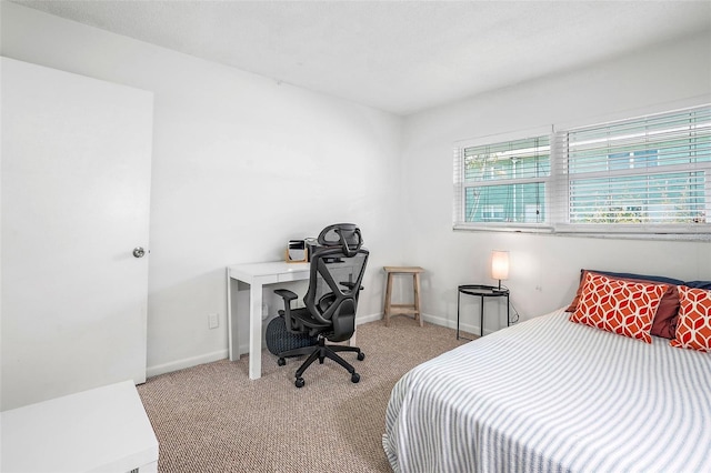 bedroom featuring light colored carpet