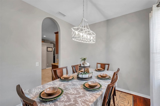 dining area featuring light wood-type flooring