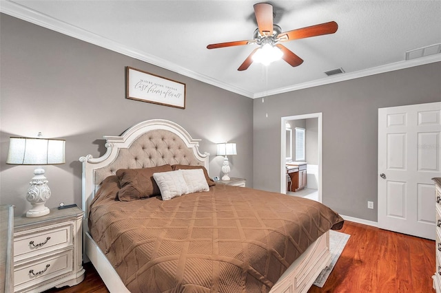 bedroom with ceiling fan, ornamental molding, dark hardwood / wood-style floors, and ensuite bath