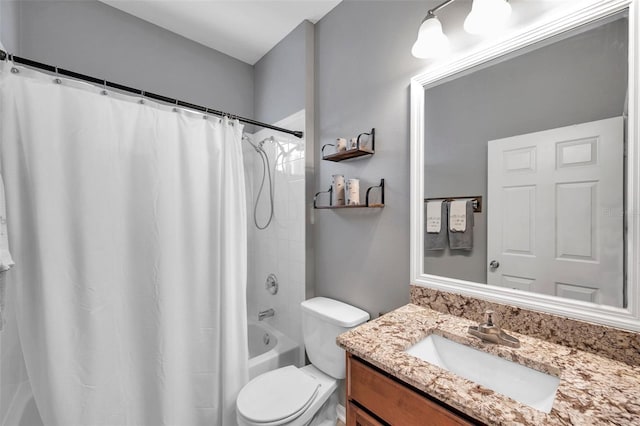 full bathroom featuring vanity, toilet, and shower / bath combo with shower curtain